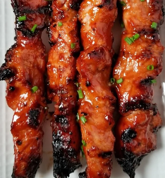 Delicious BBQ Pork Skewers with Filipino BBQ Marinade served on a platter