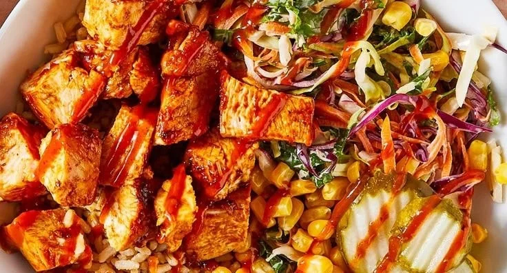 Delicious BBQ Protein Bowl filled with grilled meats and fresh vegetables