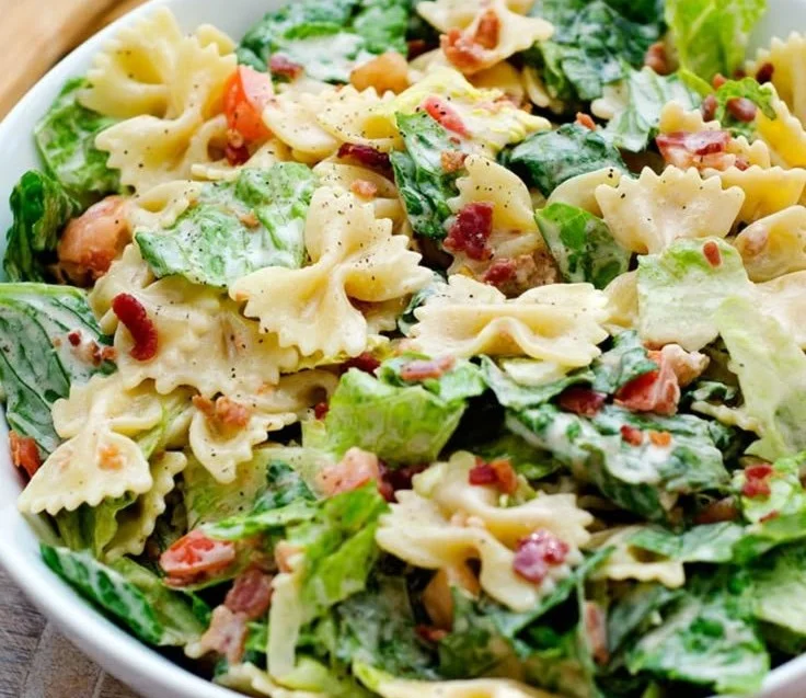 Colorful BLT Pasta Salad with bacon, lettuce, tomatoes, and pasta in a bowl
