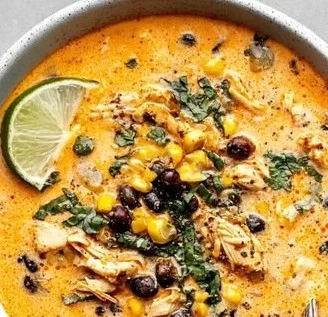 Delicious bowl of Chicken Poblano Soup garnished with cilantro