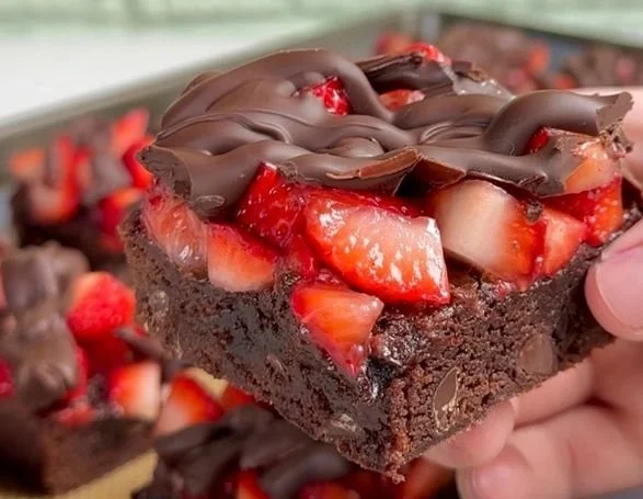 Delicious chocolate covered strawberry brownies on a plate