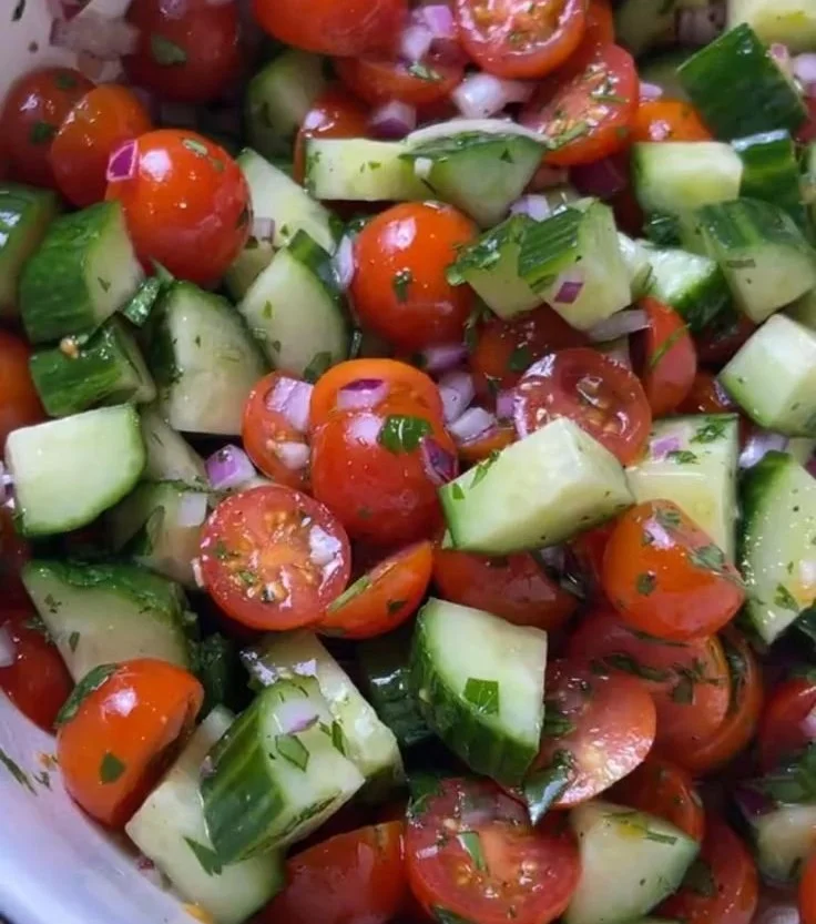 Cucumber, Onion, and Tomato Salad served in a bowl