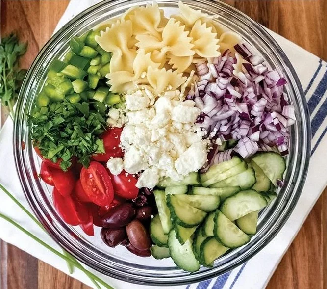 Delicious Greek Pasta Salad with fresh vegetables and feta cheese