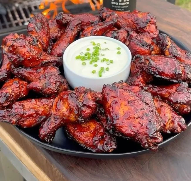 Happy New Year fire BBQ wings served on a festive platter