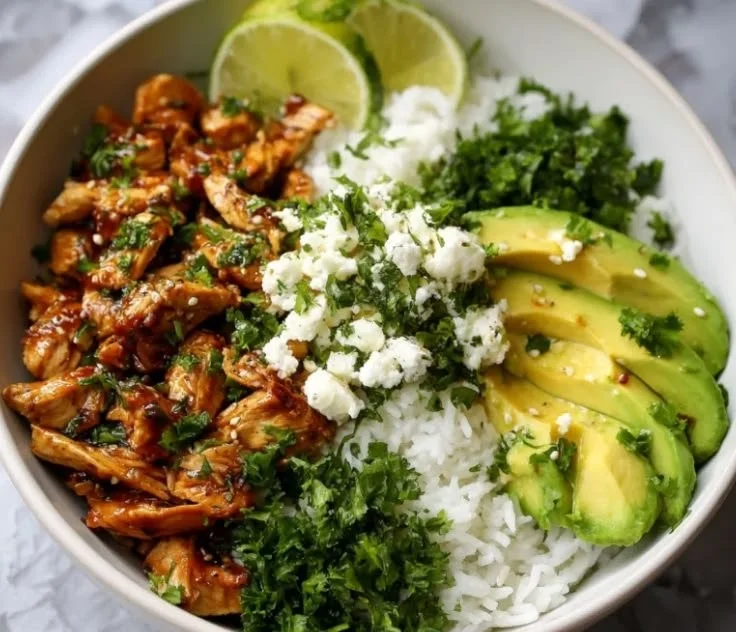 Honey Lime Chicken with Avocado Rice in a healthy dinner bowl
