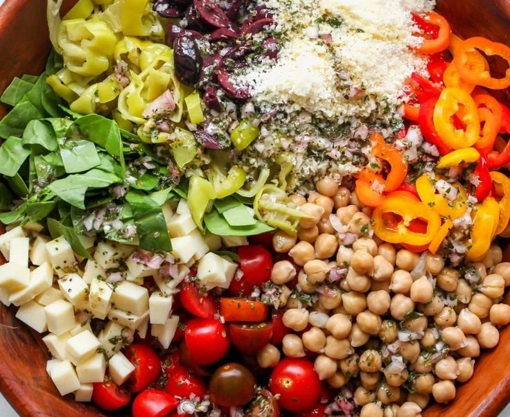 Colorful Italian pasta salad with fresh vegetables and dressing
