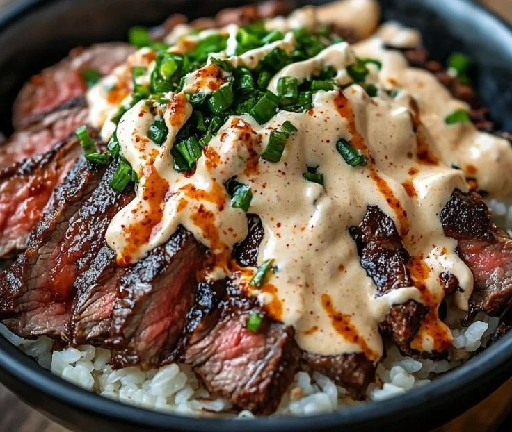 Korean BBQ steak rice bowl with vibrant vegetables and flavorful marinade
