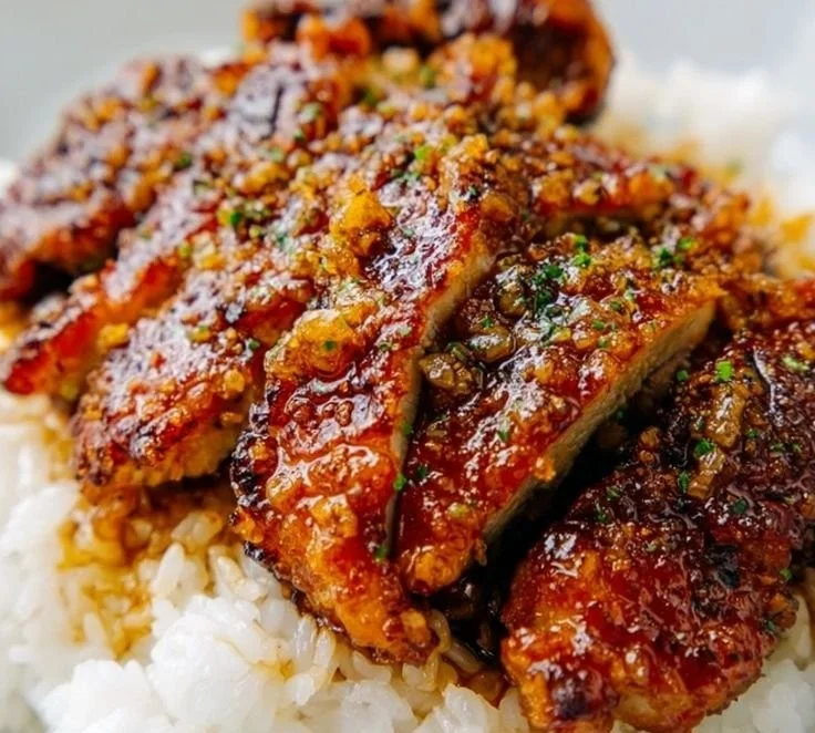 Plate of Lazy Honey Garlic Chicken garnished with green onions.