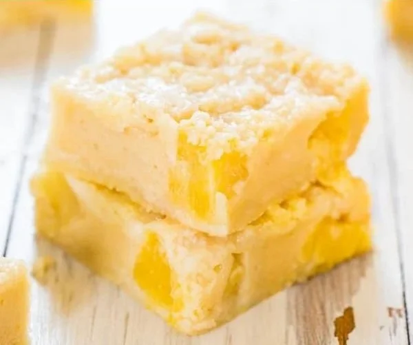 Delicious Pineapple Crumble Bars with a golden crumbly topping