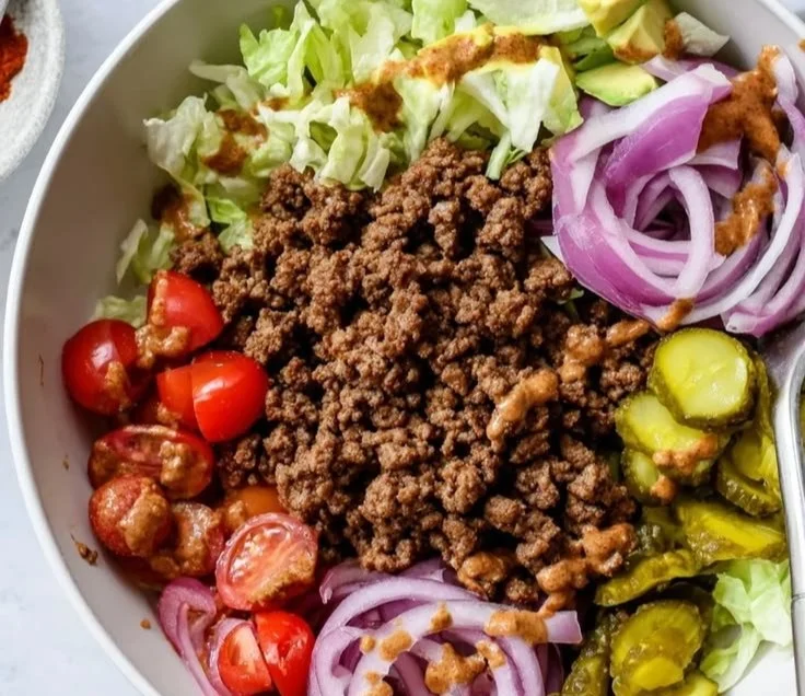 Savory protein-packed burger bowls with fresh ingredients and vibrant toppings.