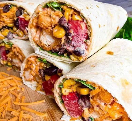 Delicious Southwest Chicken Wrap filled with fresh vegetables and zesty spices.