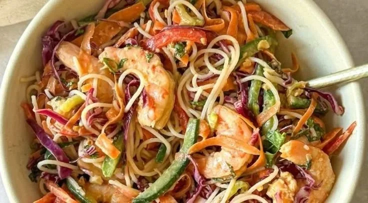 Healthy Spring Roll Bowl with vibrant veggies and creamy peanut dressing