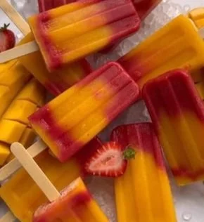 Refreshing strawberry mango popsicles on a sunny day