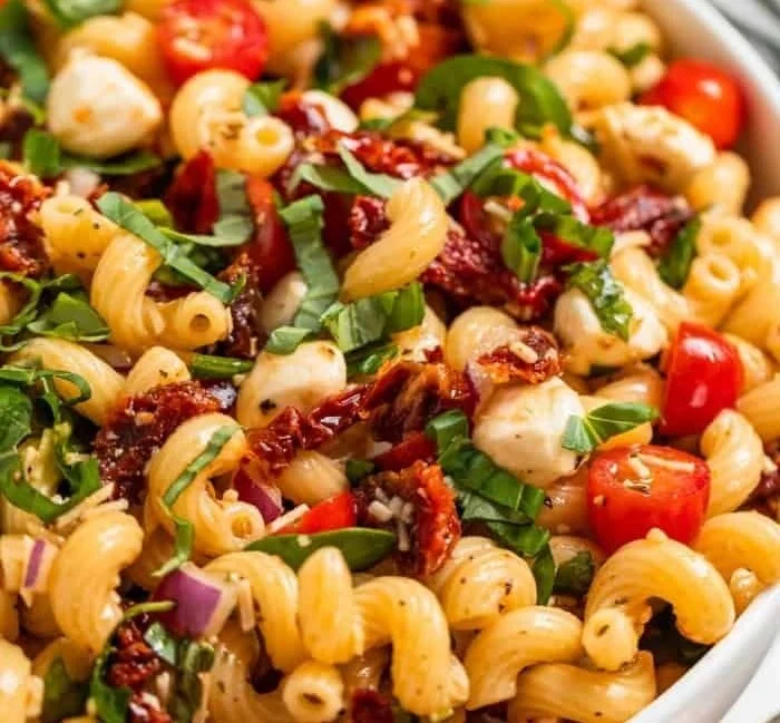 Colorful Sun Dried Tomato Pasta Salad with fresh ingredients