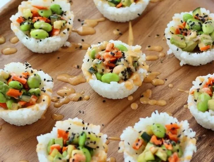 Colorful and appetizing sushi cups filled with fresh ingredients