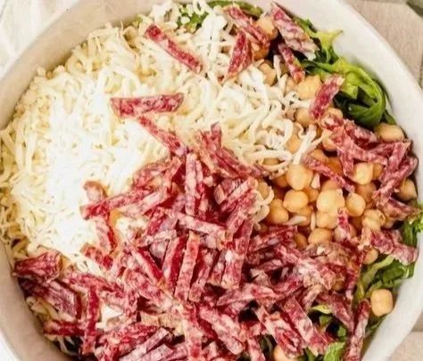 Fresh Scala Chopped Salad with a variety of colorful vegetables and toppings