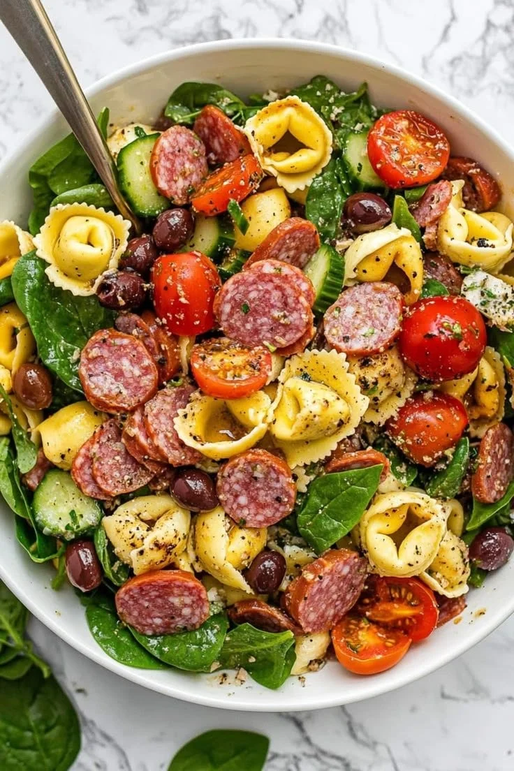 Delicious Tortellini Pasta Salad with fresh vegetables and herbs
