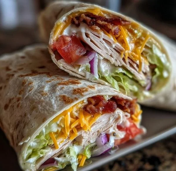 Delicious Turkey Ranch Club Wrap filled with fresh ingredients and savory flavors