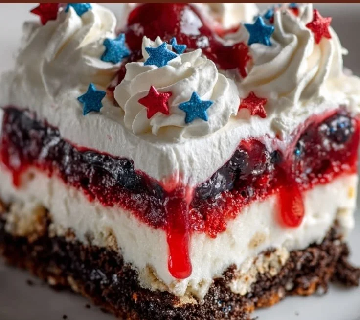 4th of July Dessert Lasagna with red, white, and blue layers for a festive treat