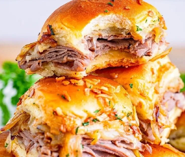 Delicious Au Jus beef sliders on slider buns with tender roast beef