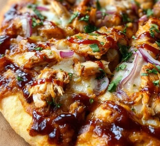 Delicious BBQ Chicken Pizza topped with smoked chicken and BBQ sauce