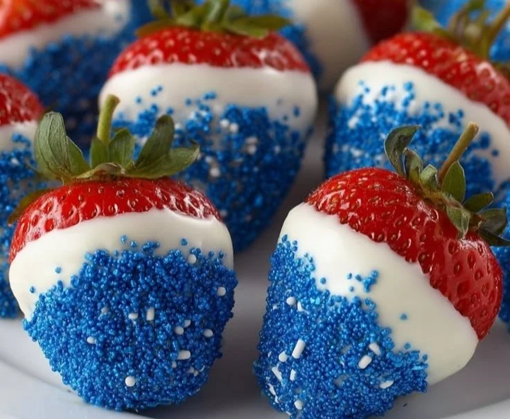 Delicious chocolate dipped strawberries on a white plate.