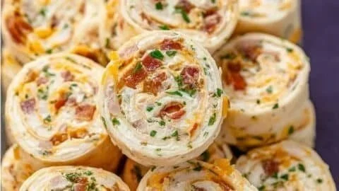 Delicious Crack Chicken Pinwheels garnished and ready to serve.