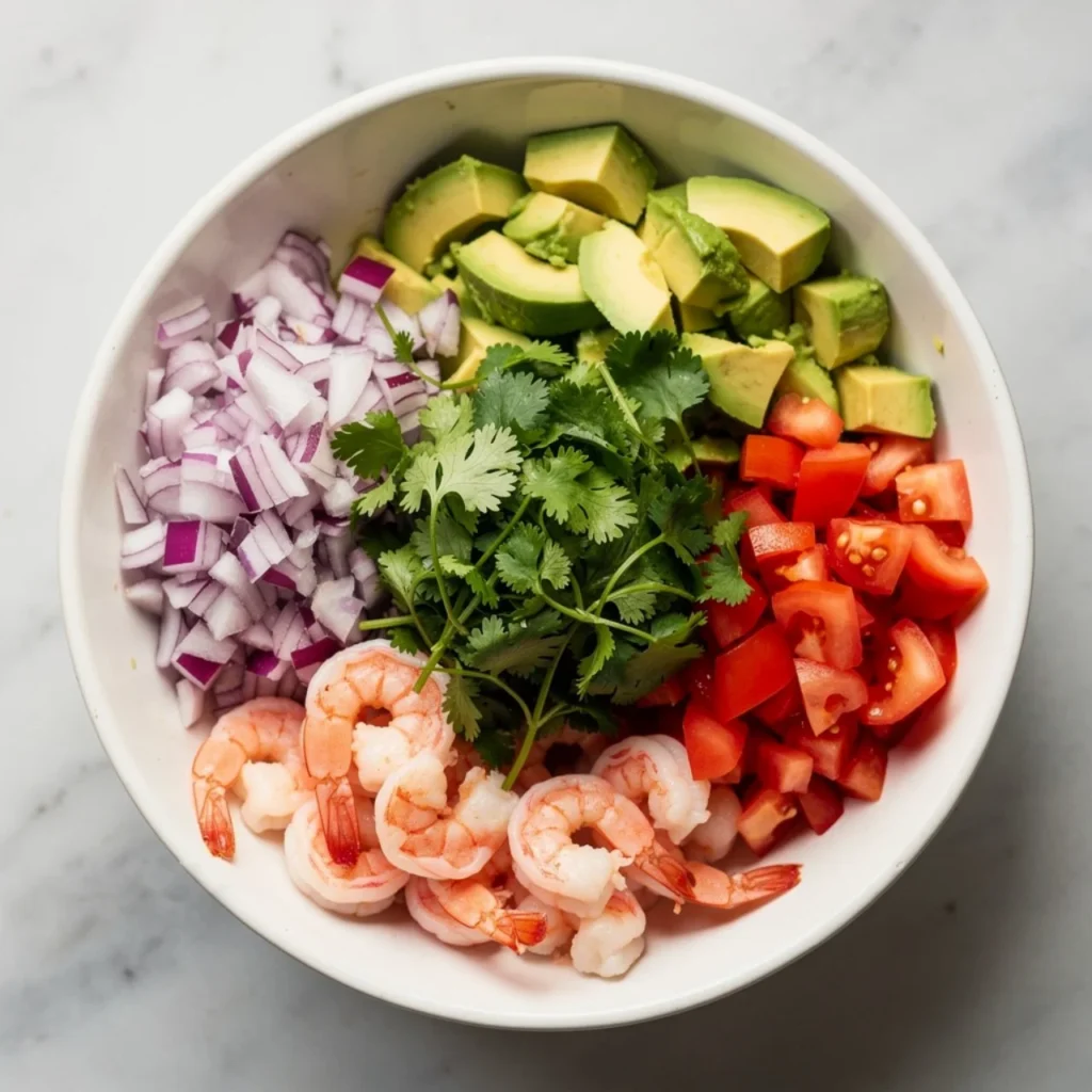 Fresh shrimp ceviche served with lime and cilantro in a bowl