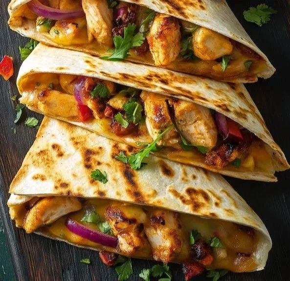 Delicious homemade quesadillas with cheese and toppings