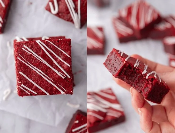 Decadent red velvet brownies with cream cheese frosting on a white plate