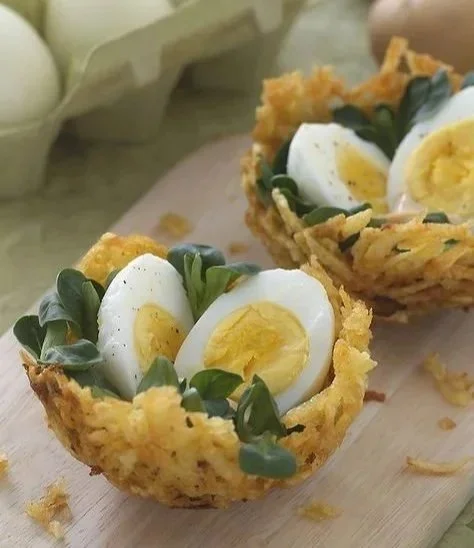 Crispy potato nests topped with eggs, perfect for breakfast or brunch.